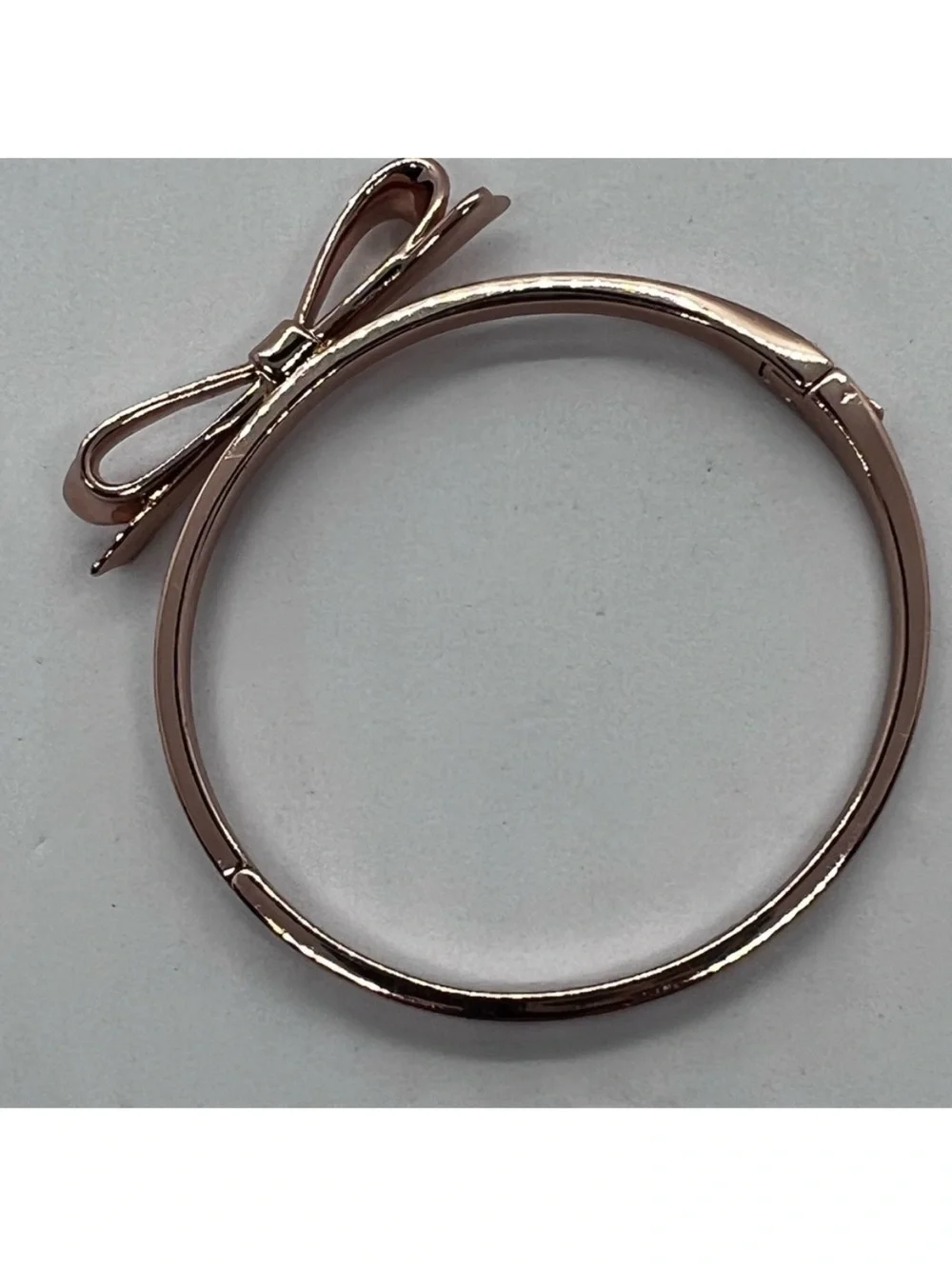 kate spade Rose Gold Bow Bangle Bracelet with dust bag.